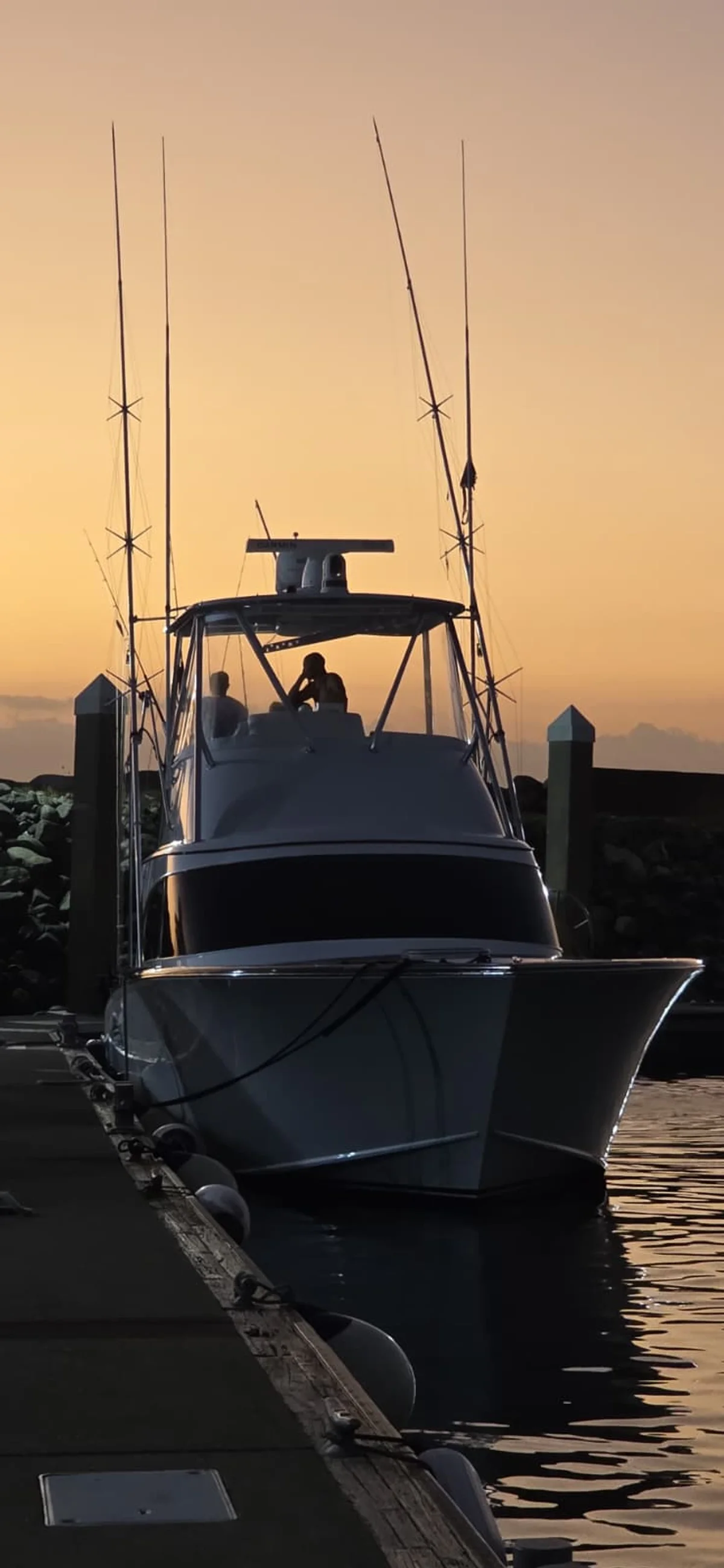 Legacy Fishing Costa Rica charter boat departing Marina Pez Vela at golden hour